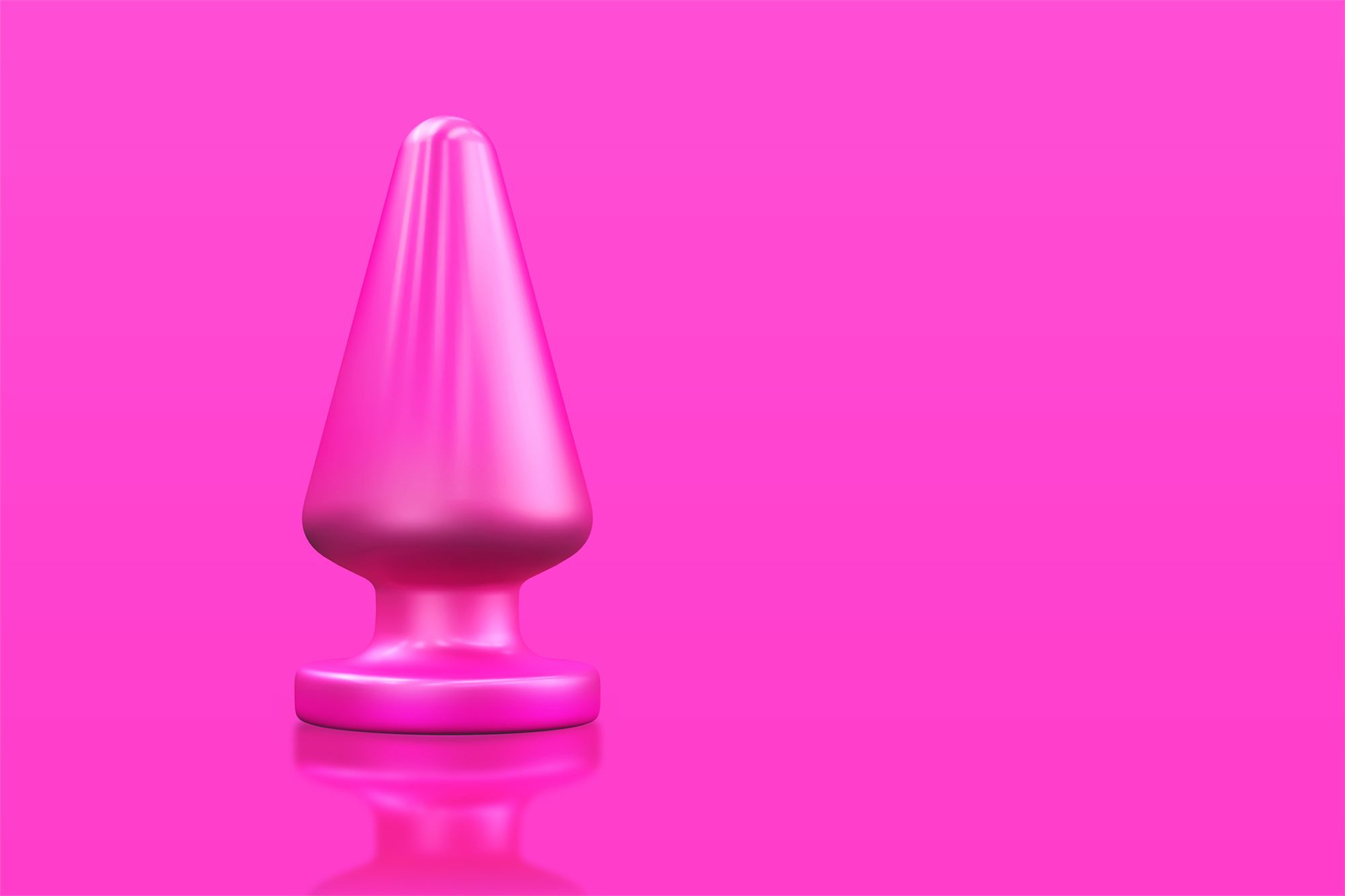 Pinker Analplug auf pinkem Hintergrund