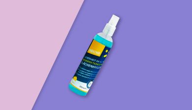 Flächendesinfektionsmittel von Toysterile vor rosa-lilanem Hintegrund