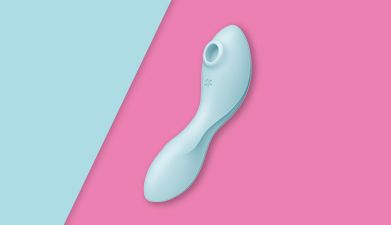 Türkiser Bluetooth Druckwellenvibrator Satisfyer 'Curvy Trinity 5 Connect App' auf türkis-pink getei