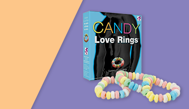 'Candy Love Rings' Fun Sextoy von Spencer & Fleetwood vor einem orange-lilanen Hintergrund