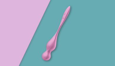 Rosane Bluetooth Liebeskugeln Satisfyer 'Love Birds 1 Connect App' auf rosa-petrol geteiltem Hinterg