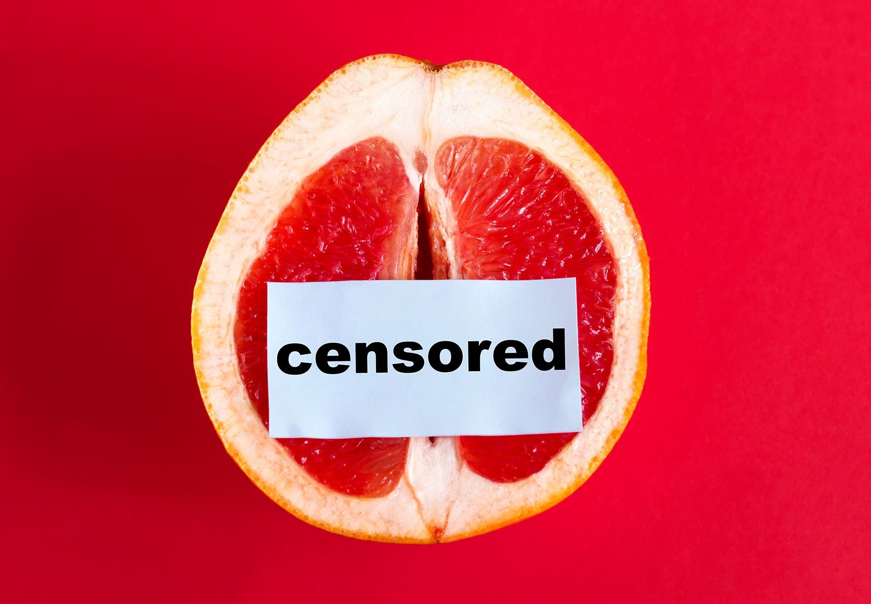 Halbe Orange mit Censored Schild