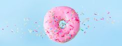 Mann Anal Orgasmus  - Abbildung eines pinken Donuts mit bunten Streuseln